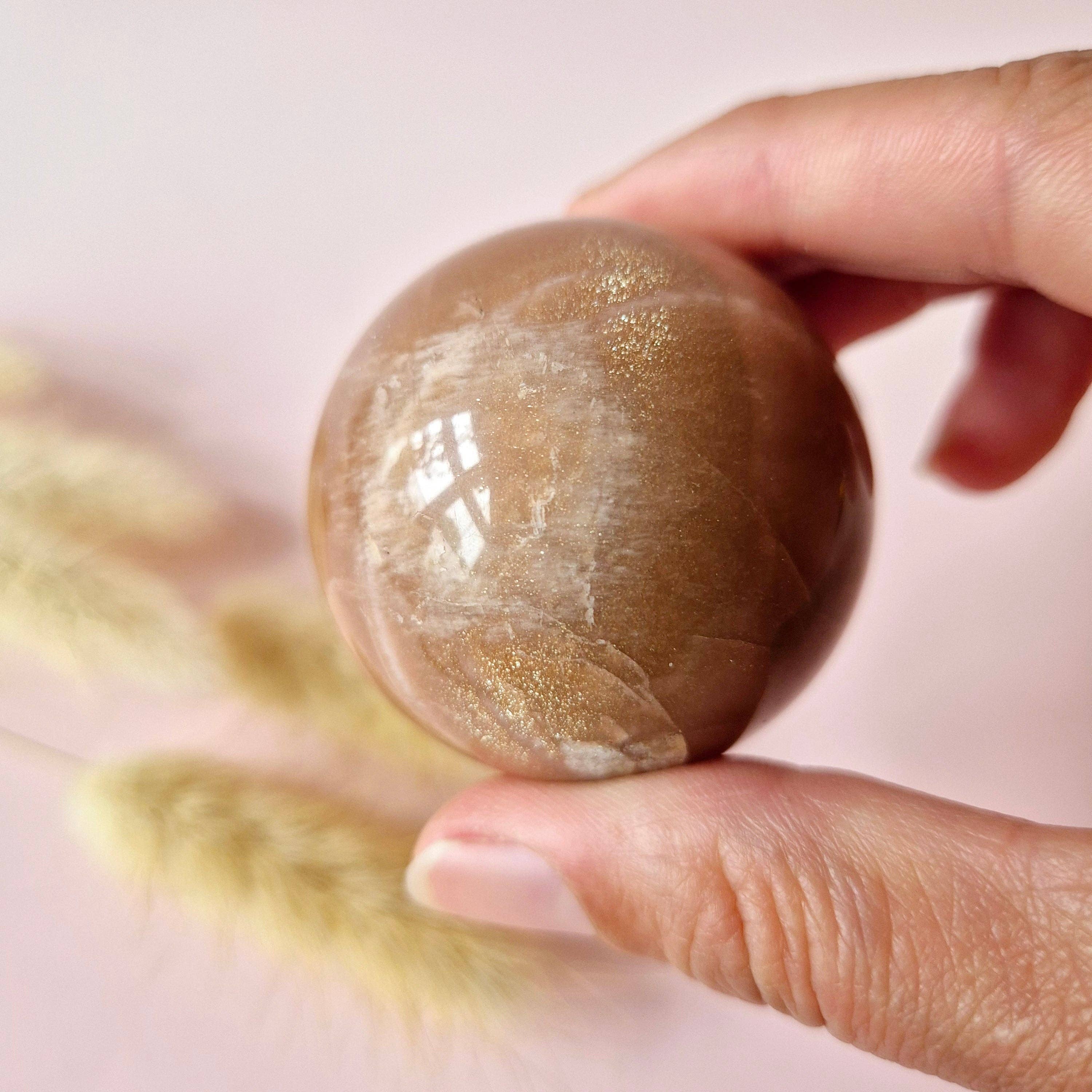 Crystal Gemstone Golden Sunstone Sphere with Blue & Gold Flash | 45–63 mm sphere: 63mm